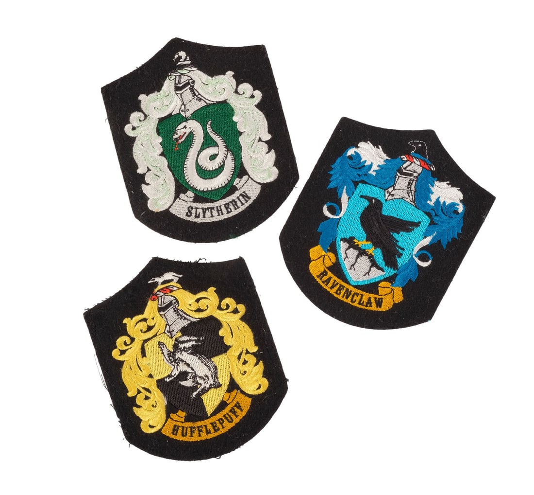 HARRY POTTER SERIES (2001 - 2011) - Set of Three Hogwarts House Patches: HARRY POTTER SERIES (2001 - 2011) - Set of Three Hogwarts House Patches - A set of three Hogwarts house patches from the Harry Potter film series. Throughout the films, students at Hogwarts School of