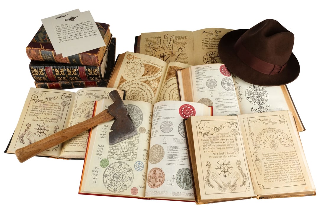 THE HOUSE WITH A CLOCK IN ITS WALLS (2018) - Jonathan Barnavelt's (Jack Black) Pair of: THE HOUSE WITH A CLOCK IN ITS WALLS (2018) - Jonathan Barnavelt's (Jack Black) Pair of Screen-Matched Magic Books with Ax, Stunt Fedora, Seven Additional Books, and Letter to Lewis (Owen Vaccaro) - Jo