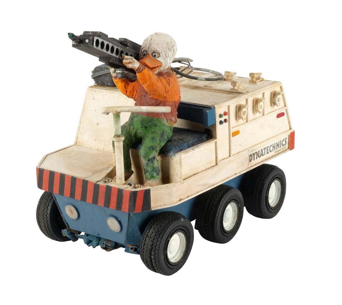 HOWARD THE DUCK (1986) - Howard and Neutron Disintegrator Model Miniature: HOWARD THE DUCK (1986) - Howard and Neutron Disintegrator Model Miniature - A Howard and neutron disintegrator model miniature from Willard Huyck's Howard the Duck. Howard (Ed Gale/Chip Zien) and Phil