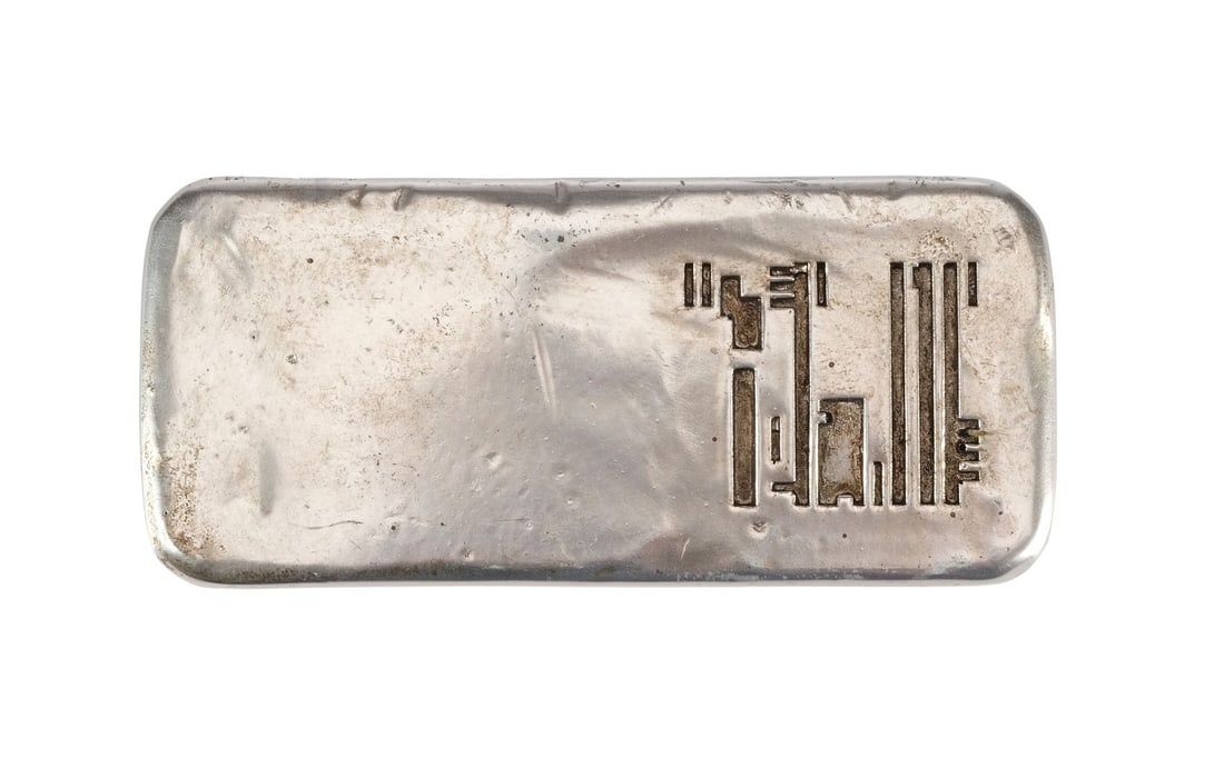 LOOPER (2012) - Silver Currency Ingot: LOOPER (2012) - Silver Currency Ingot - A silver currency ingot from Rian Johnson's Looper. In the future society, Mob hits took place with targets sent into the past where they'd be killed by loopers