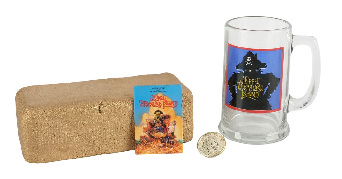 MUPPET TREASURE ISLAND (1996) - Hidden Treasure Gold Bar and Coin with Crew Mug and Pin: MUPPET TREASURE ISLAND (1996) - Hidden Treasure Gold Bar and Coin with Crew Mug and Pin - A hidden treasure gold bar and coin with a crew mug and pin from Brian Henson and Mark Loparco's Muppet Treasu