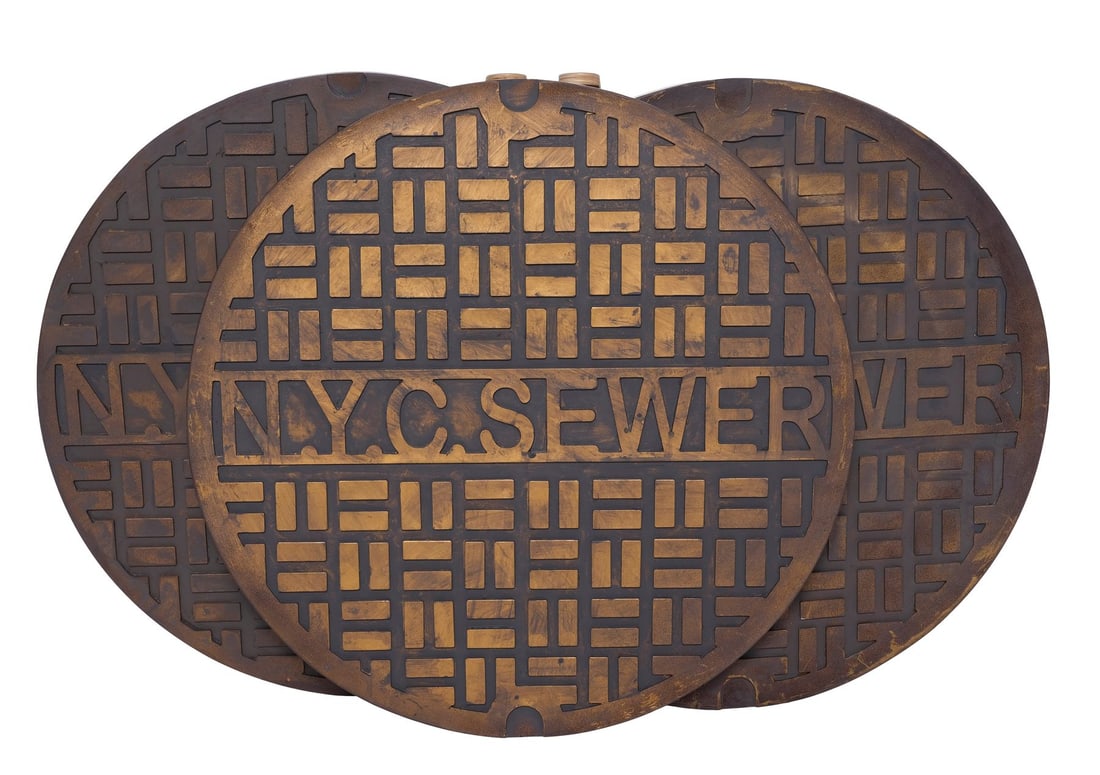 TEENAGE MUTANT NINJA TURTLES: OUT OF THE SHADOWS (2016) - Set of Three New York City Sewer Manhole: TEENAGE MUTANT NINJA TURTLES: OUT OF THE SHADOWS (2016) - Set of Three New York City Sewer Manhole Covers - A set of three New York City sewer manhole covers from Paramount Pictures' Teenage Mutant Ni