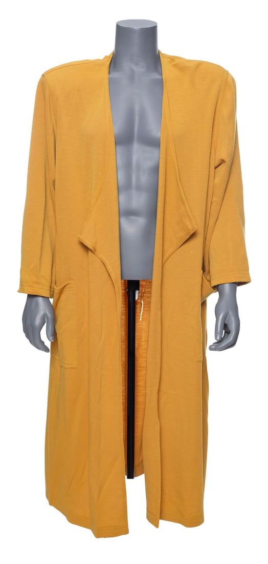 TOTAL RECALL (1990) - Douglas Quaid's Stunt Disguise Dress and Boots: TOTAL RECALL (1990) - Douglas Quaid's Stunt Disguise Dress and Boots - Douglas Quaid's stunt disguise dress and boots from Paul Verhoeven's Total Recall. Upon arriving on Mars, Quaid (Arnold Schwarzen