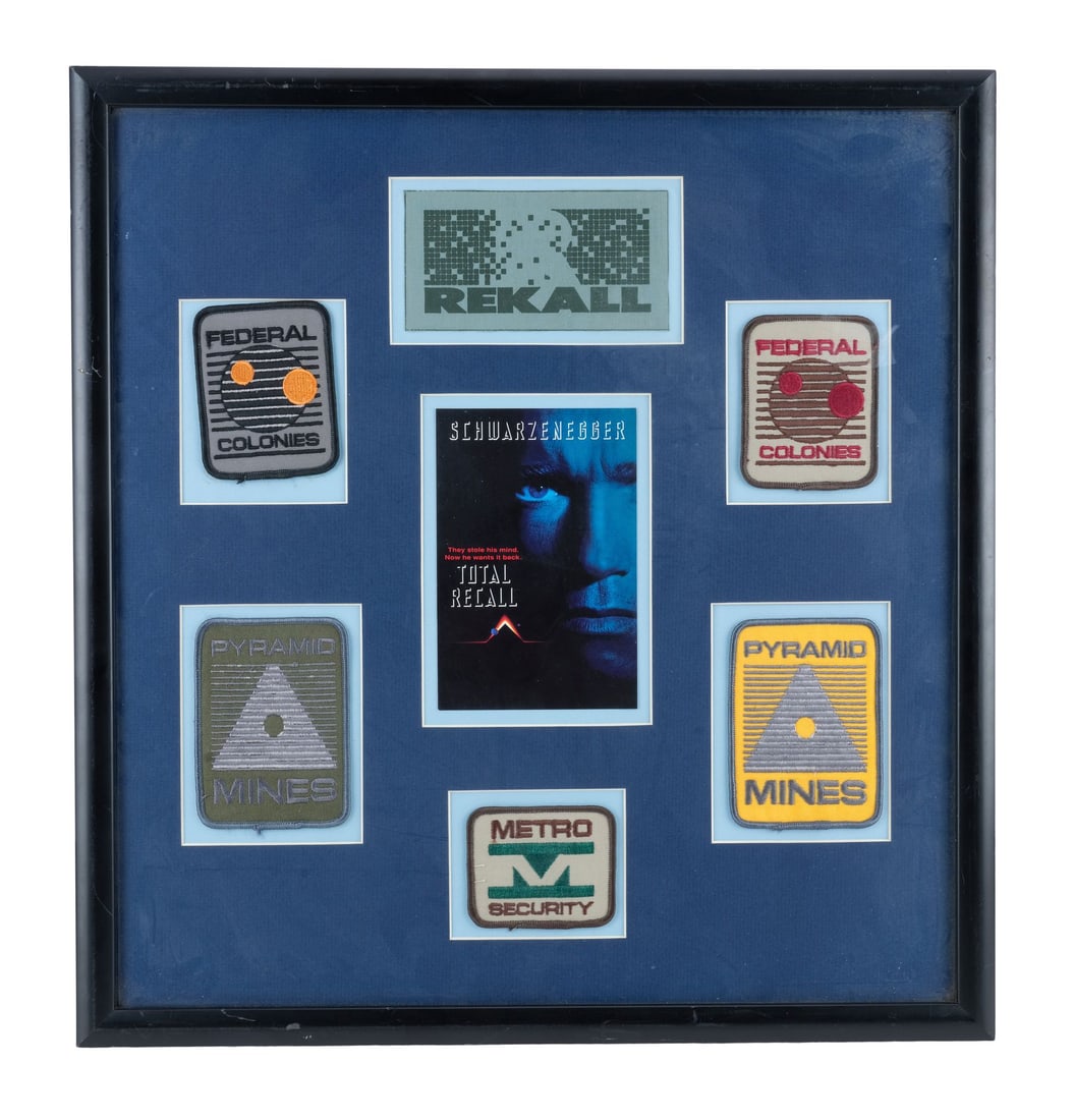 TOTAL RECALL (1990) - Framed Set of Six Patches: TOTAL RECALL (1990) - Framed Set of Six Patches - A framed set of six patches from Paul Verhoeven's Total Recall. During his first dream sequence, Douglas Quaid (Arnold Schwarzenegger) donned a spaces
