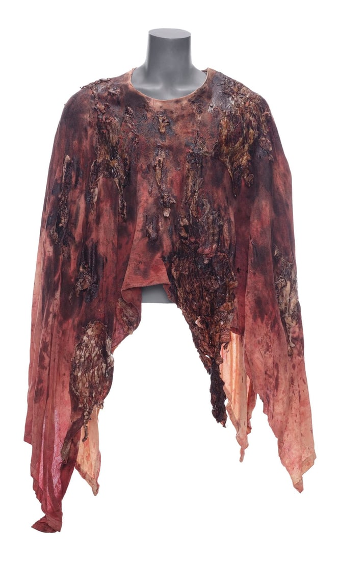 THE WALKING DEAD (T.V. SERIES, 2010 - 2022) - Rick Grimes' (Andrew Lincoln) Bloodied Walker-Gut: THE WALKING DEAD (T.V. SERIES, 2010 - 2022) - Rick Grimes' (Andrew Lincoln) Bloodied Walker-Gut Poncho - Rick Grimes' (Andrew Lincoln) bloodied walker-gut poncho from AMC's The Walking Dead. Rick and