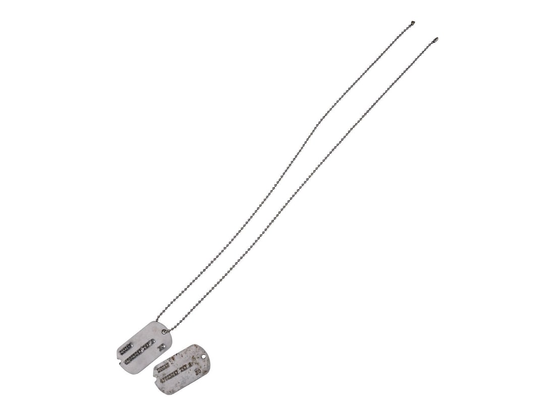 X-MEN ORIGINS: WOLVERINE (2009) - Pair of Logan's (Hugh Jackman) Dog Tags: X-MEN ORIGINS: WOLVERINE (2009) - Pair of Logan's (Hugh Jackman) Dog Tags - A pair of Logan's (Hugh Jackman) dog tags from Gavin Hood's X-Men Origins: Wolverine. Soldier and mutant James Howlett