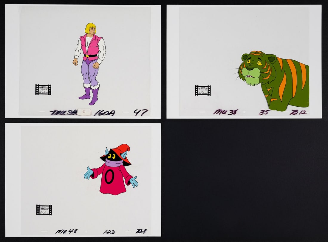HE-MAN AND THE MASTERS OF THE UNIVERSE (1983-1985) - Prince Adam, Orko and Cringer Original: HE-MAN AND THE MASTERS OF THE UNIVERSE (1983-1985) - Prince Adam, Orko and Cringer Original Production Cels - There is something quietly perfect about this trio of production cels. Prince Adam, Cringe