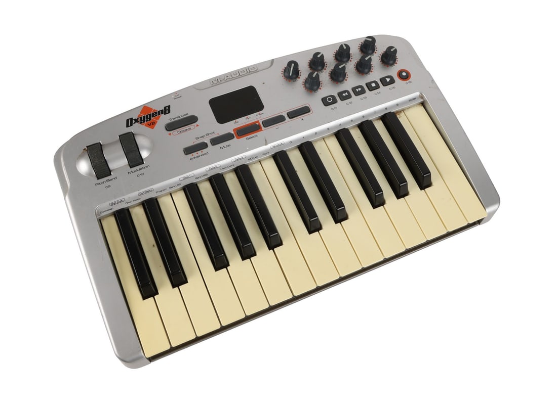 AMY WINEHOUSE - Amy Winehouse-Owned M-Audio Oxygen 8 V2 Keyboard: AMY WINEHOUSE - Amy Winehouse-Owned M-Audio Oxygen 8 V2 Keyboard - An M-Audio Oxygen 8 V2 MIDI keyboard controller, formerly owned by Amy Winehouse. While Winehouse was best known for her vocal perfor