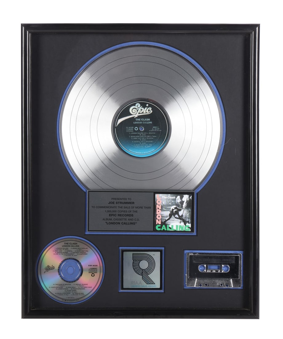 THE CLASH - London Calling Platinum Disc Award Presented to Joe Strummer (1 of 4)