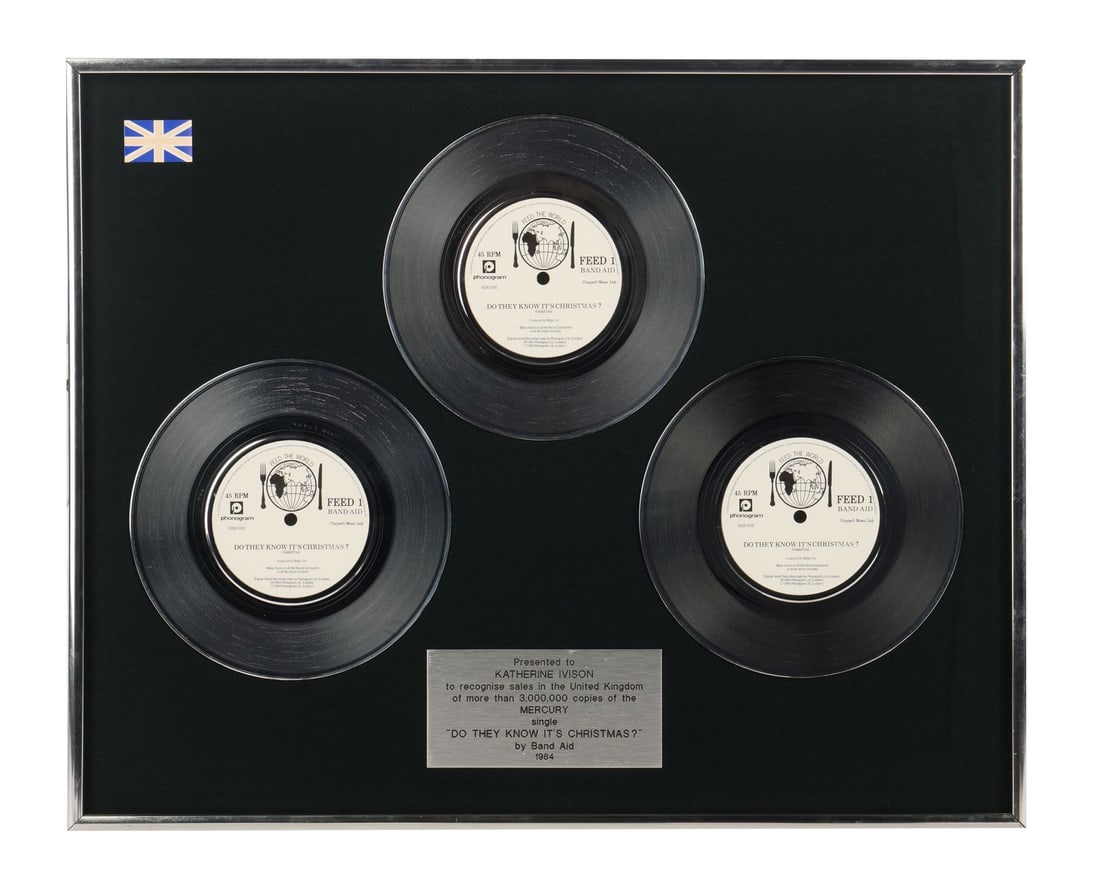 BAND AID - Do They Know It's Christmas? Three Platinum Disc Award Presented to Katherine Ivison (1 of 4)