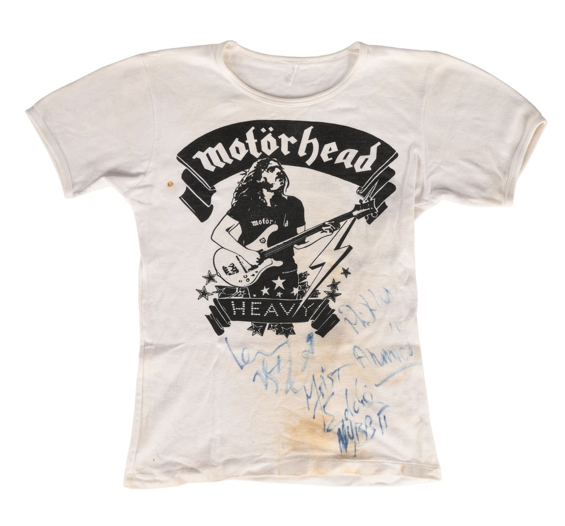 MOTORHEAD - Lemmy, Phil Taylor and "Fast" Eddie Clarke-Autographed Motorhead T-Shirt Owned by Lemmy: MOTORHEAD - Lemmy, Phil Taylor and "Fast" Eddie Clarke-Autographed Motorhead T-Shirt Owned by Lemmy - A Motörhead T-shirt formerly owned by Lemmy Kilmister autographed by the frontman and two oth