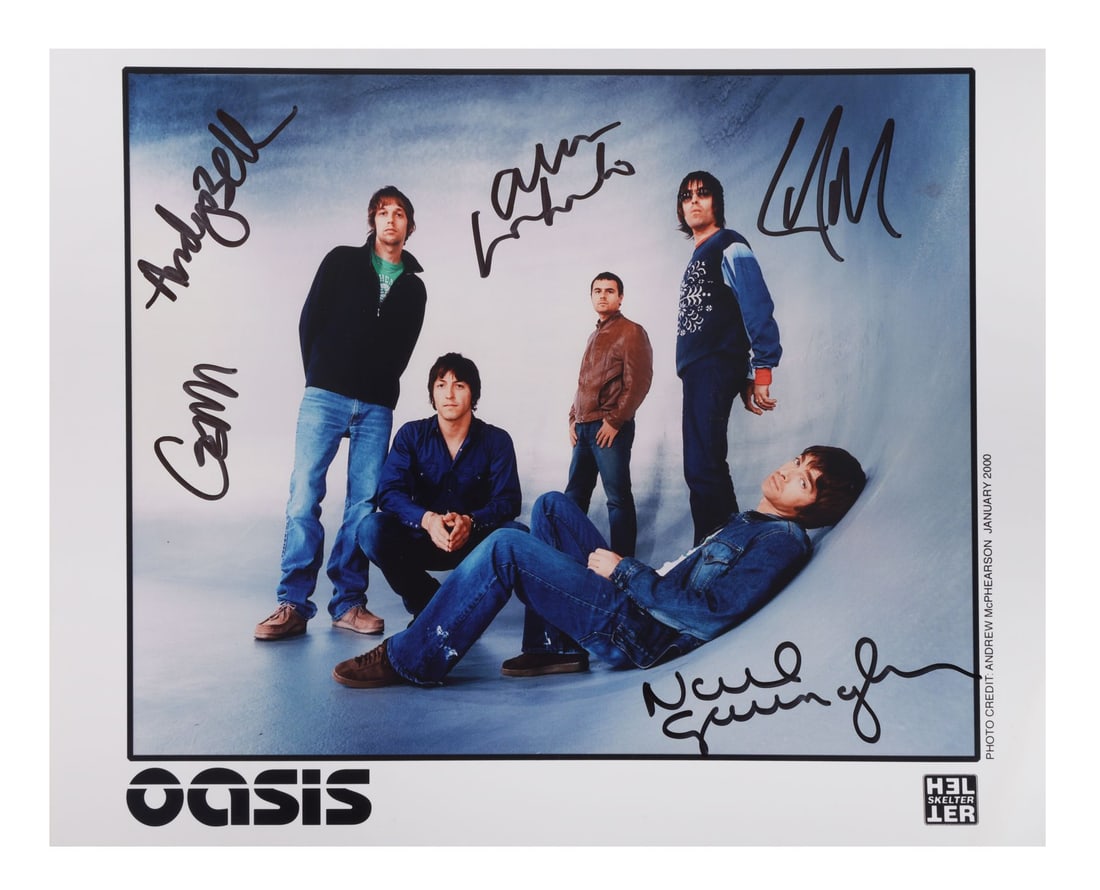 OASIS - Noel Gallagher, Liam Gallagher, Gem Archer, Andy Bell and Alan White-Autographed Photograph: OASIS - Noel Gallagher, Liam Gallagher, Gem Archer, Andy Bell and Alan White-Autographed Photograph - A photograph of the band Oasis, autographed by the members of the band. The photo has been autogra