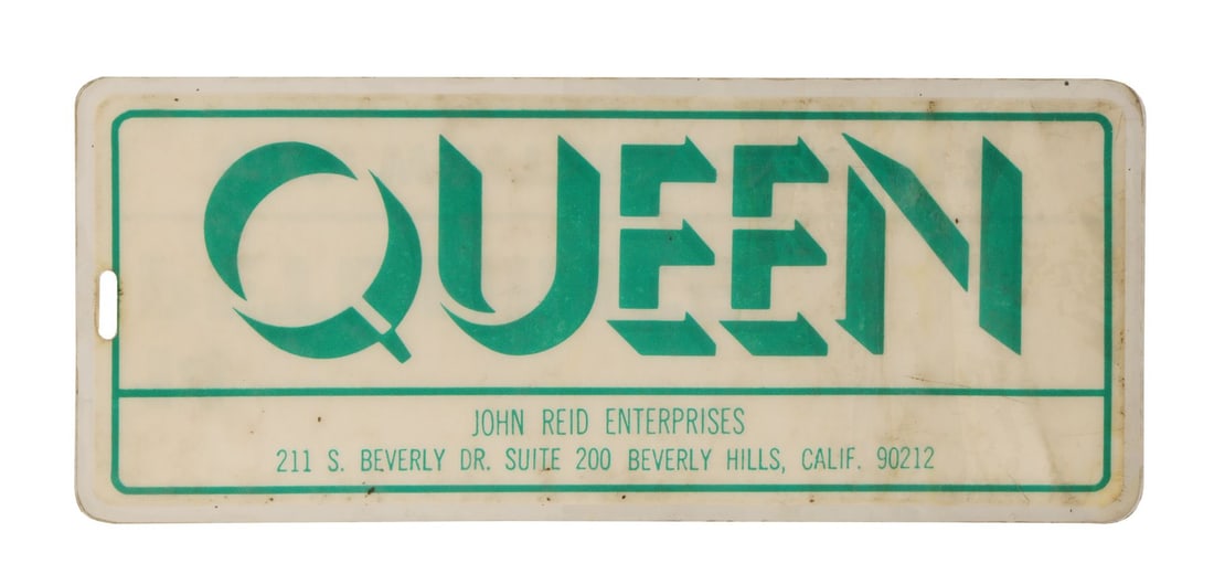 QUEEN - The Peter Hince Collection: US News of the World Tour Personal Luggage Tag, 1977: QUEEN - The Peter Hince Collection: US News of the World Tour Personal Luggage Tag, 1977 - A personal luggage tag belonging to Peter Hince, created for use on the US' News of The World Tour' which too