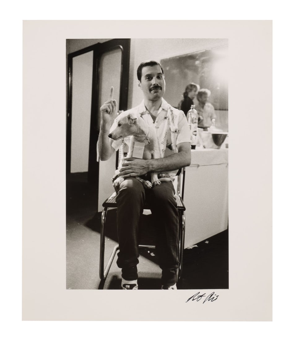 QUEEN - The Peter Hince Collection: Silver Gelatin Freddie Mercury Holding Freddie the Dog Print,: QUEEN - The Peter Hince Collection: Silver Gelatin Freddie Mercury Holding Freddie the Dog Print, 1986 - A vintage hand-printed silver gelatin print of Freddie Mercury holding a dog, taken backstage i