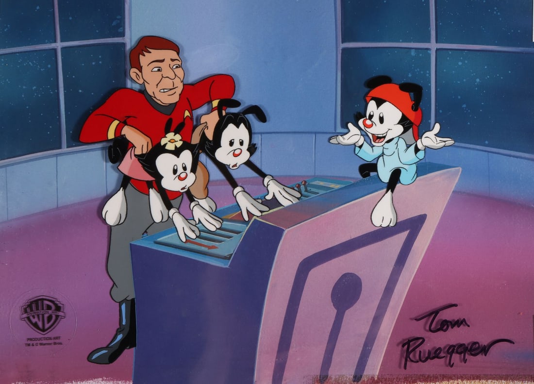 ANIMANIACS (TV SERIES, 1993-1998) - Yakko, Wakko, Dot and Squaty Original Production Cel from "Star: ANIMANIACS (TV SERIES, 1993-1998) - Yakko, Wakko, Dot and Squaty Original Production Cel from "Star Truck" on Studio Printed Photographic Background Signed by Tom Ruegger - The Warner siblings are loo