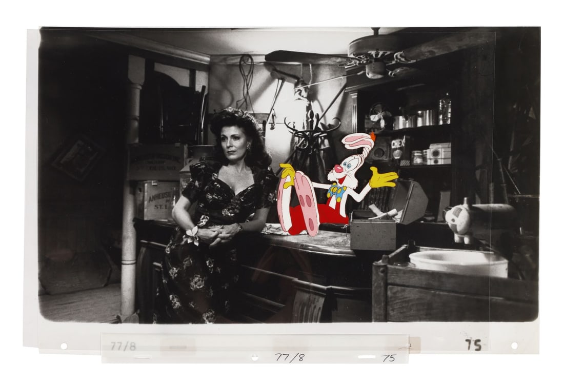 WHO FRAMED ROGER RABBIT (1988) - Dolores and Roger Rabbit Original Production Cel on Studio Printed: WHO FRAMED ROGER RABBIT (1988) - Dolores and Roger Rabbit Original Production Cel on Studio Printed Photographic Background - Roger leaps into the chair in the back room of Dolores's bar, and the gag 