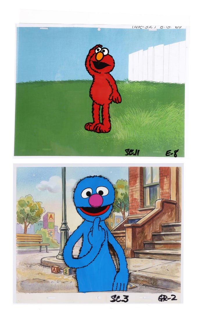 SESAME STREET (TV SERIES, 1969-PRESENT) - Elmo and Grover Pair of Original Production Cels on: SESAME STREET (TV SERIES, 1969-PRESENT) - Elmo and Grover Pair of Original Production Cels on Printed Presentation Backgrounds - Two of Sesame Street's most beloved characters come together in this pa