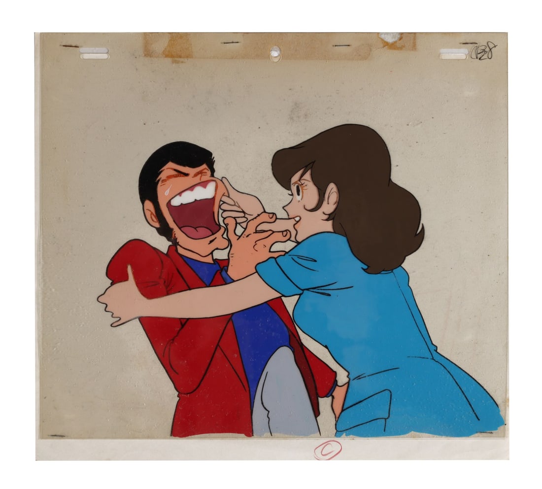 LUPIN THE THIRD PART 2 (TV SERIES, 1977-1980) - Lupin and Fujiko Original Production Cel: LUPIN THE THIRD PART 2 (TV SERIES, 1977-1980) - Lupin and Fujiko Original Production Cel "Tutankhamen's 3,000 Year-Old Curse" - A superb original production cel of Lupin and Fujiko Mine from the "Red 