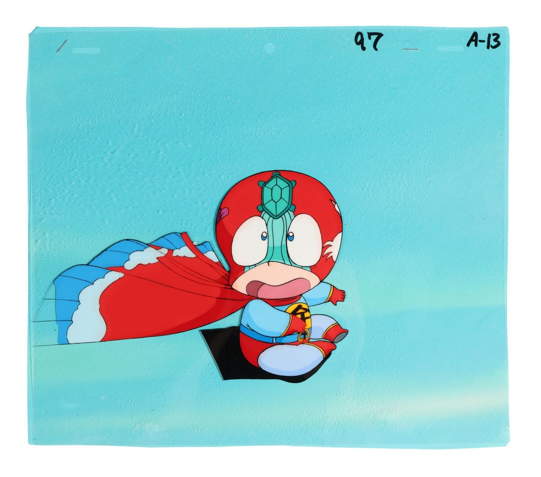 URUSEI YATSURA (TV SERIES, 1981-1986) - Ten Original Production Cel from "Man or Bird? Luxurious: URUSEI YATSURA (TV SERIES, 1981-1986) - Ten Original Production Cel from "Man or Bird? Luxurious Ally of Justice!" on Original Production Background - Ten has squeezed himself into the absurd superher