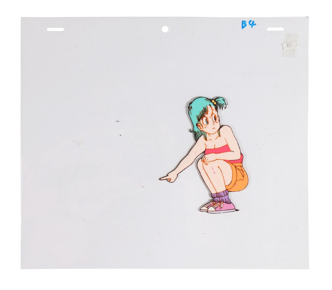 DRAGON BALL (TV SERIES, 1986-1989) - Bulma Original Production Cel from "The Trap is Sprung": DRAGON BALL (TV SERIES, 1986-1989) - Bulma Original Production Cel from "The Trap is Sprung" - Bulma crouching low and pointing at a floor full of holes, mid-scold at Goku for suggesting they just avo