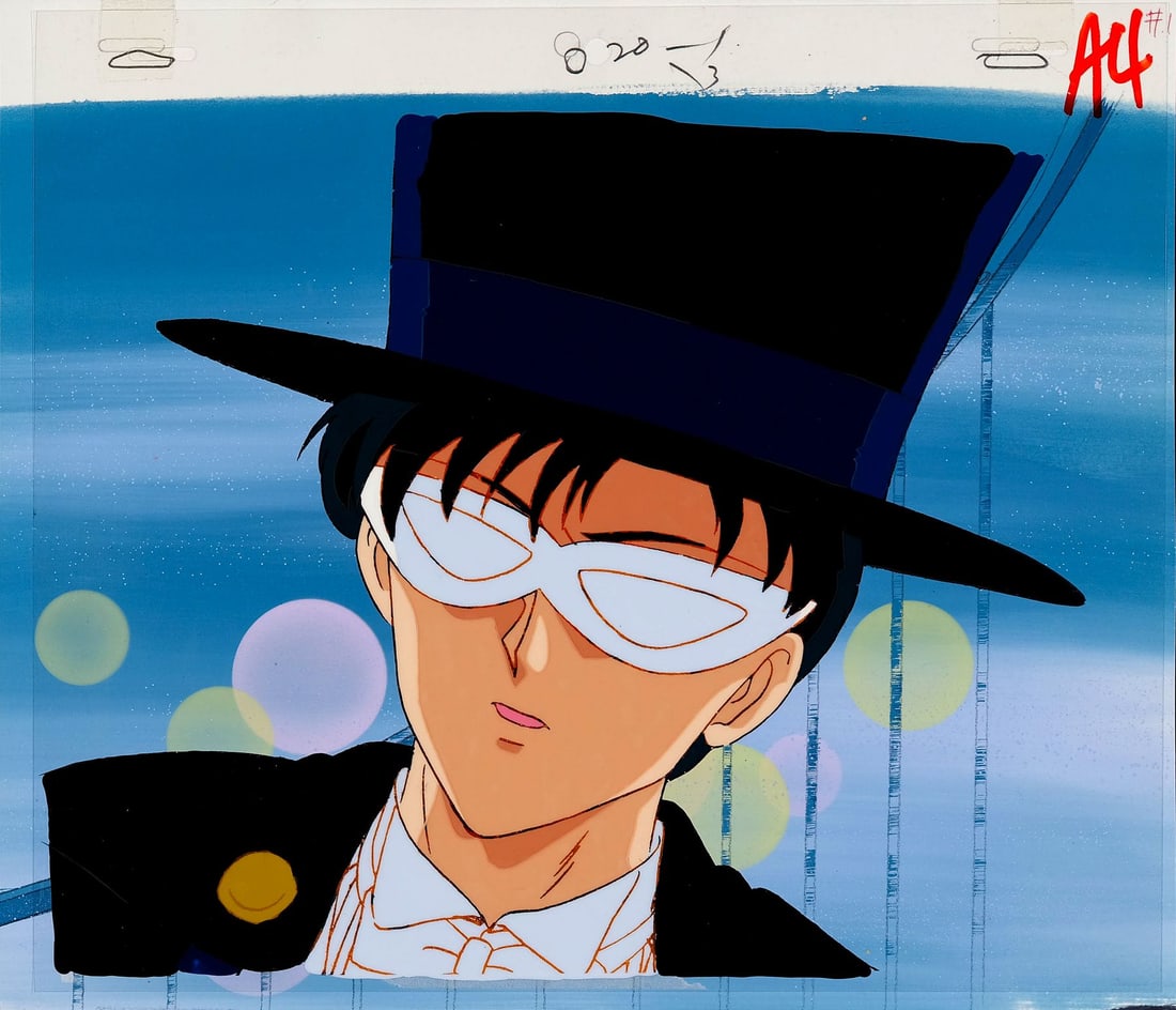 SAILOR MOON (TV SERIES, 1992-1997) - Tuxedo Mask Original Production Cel on Original Production: SAILOR MOON (TV SERIES, 1992-1997) - Tuxedo Mask Original Production Cel on Original Production Background - Tuxedo Mask is one of the great enigmas of the nineties anime. By day, he is Mamoru Chiba, 