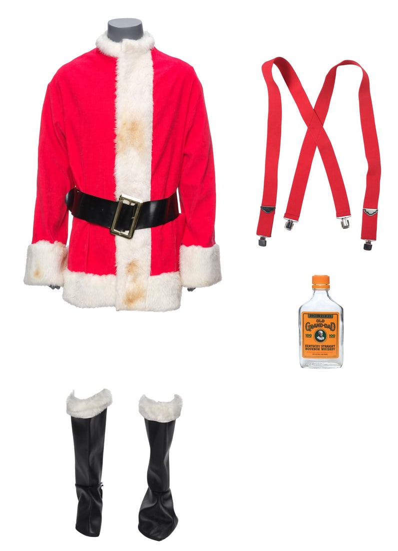 24. BAD SANTA (2003) - Willie Soke's (Billy Bob Thornton) Santa Costume Components and Bottle: Bidding for this lot will end on Wednesday, August 26th. The auction will begin at 9:30 AM (PDT) / 12:30 PM (EDT) / 5:30 PM (GMT) and lots are sold sequentially via live auctioneer; tune in to the