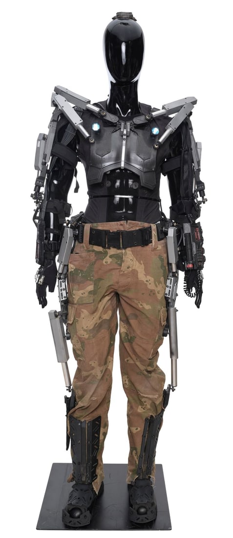 83. ELYSIUM (2013) - Agent C. M. Kruger's (Sharlto Copley) Light-Up Battle-Damaged H.U.L.C. Suit: B