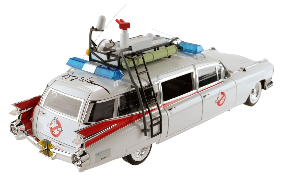 2065. GHOSTBUSTERS (1984) - Sigourney Weaver-Autographed Ecto-1 Model Miniature Replica: B