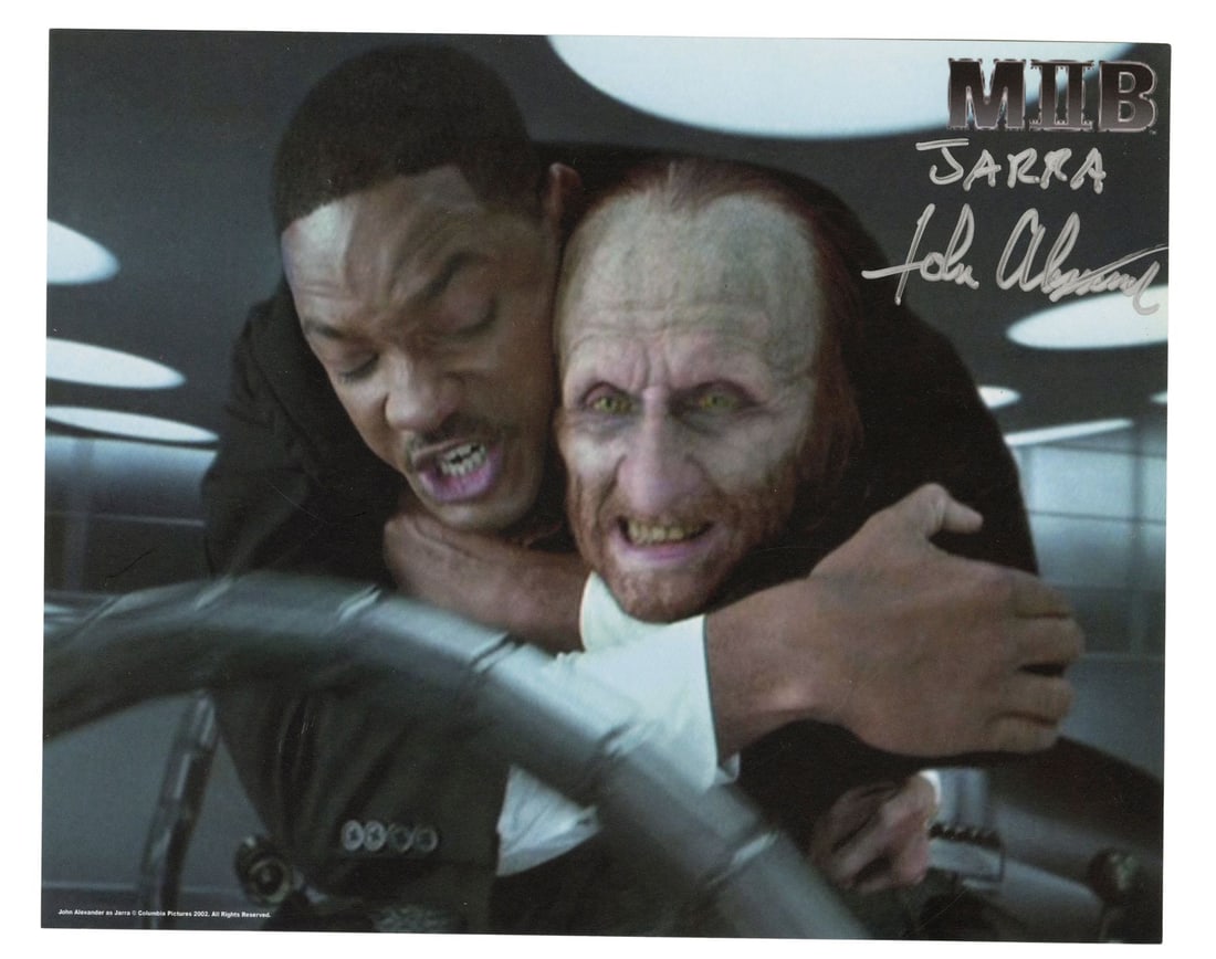 2119. MEN IN BLACK II (2002) - John Alexander-Autographed Still: B