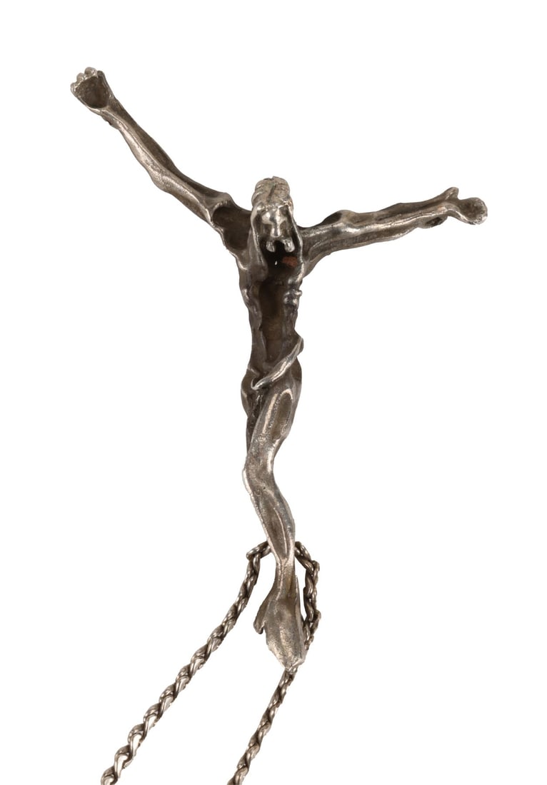 LIBERTINES, THE - Pete Doherty Stage-Worn Silver Chain Crucifix: LIBERTINES, THE - Pete Doherty Stage-Worn Silver Chain Crucifix A silver crucifix and chain, owned and worn on stage by Pete Doherty of The Libertines and Babyshambles. Pete Doherty was photographed w