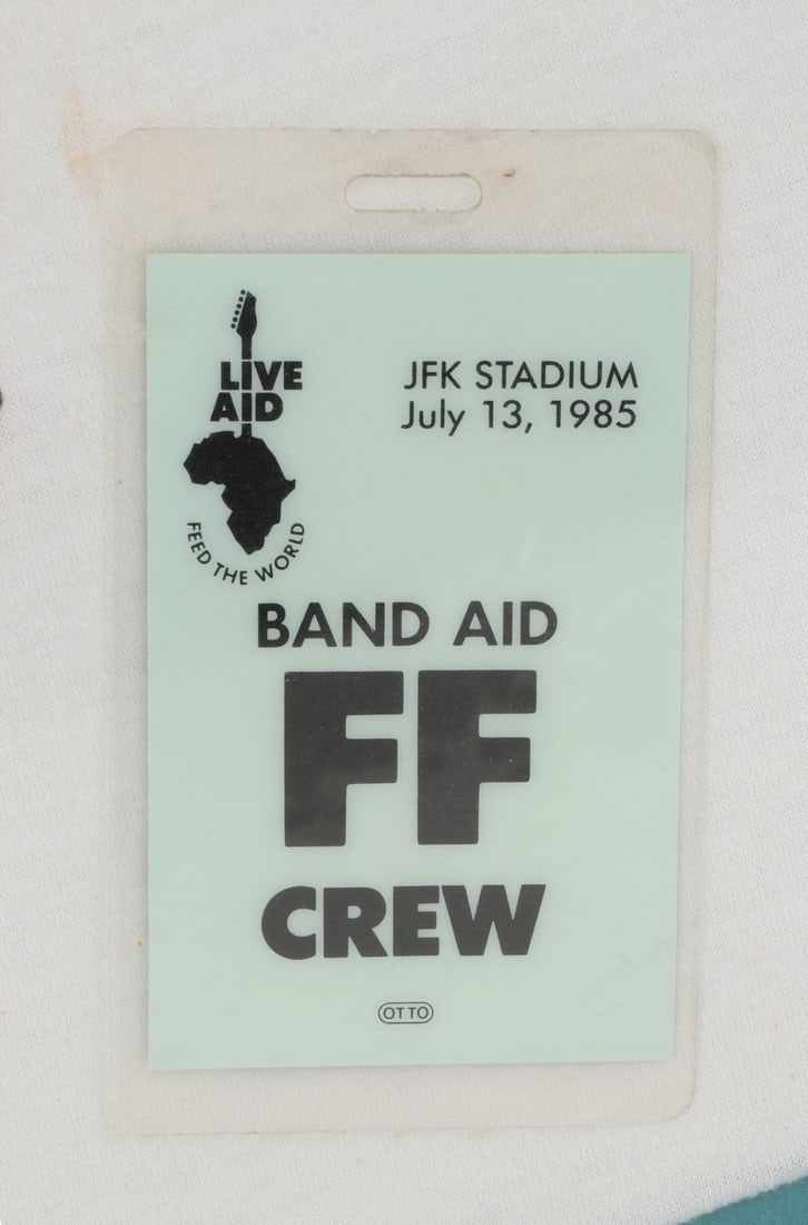 LIVE AID (1985) - Framed Live Aid T-Shirt, Eric Clapton-Branded Guitar Picks, and Crew Pass (1 of 1)