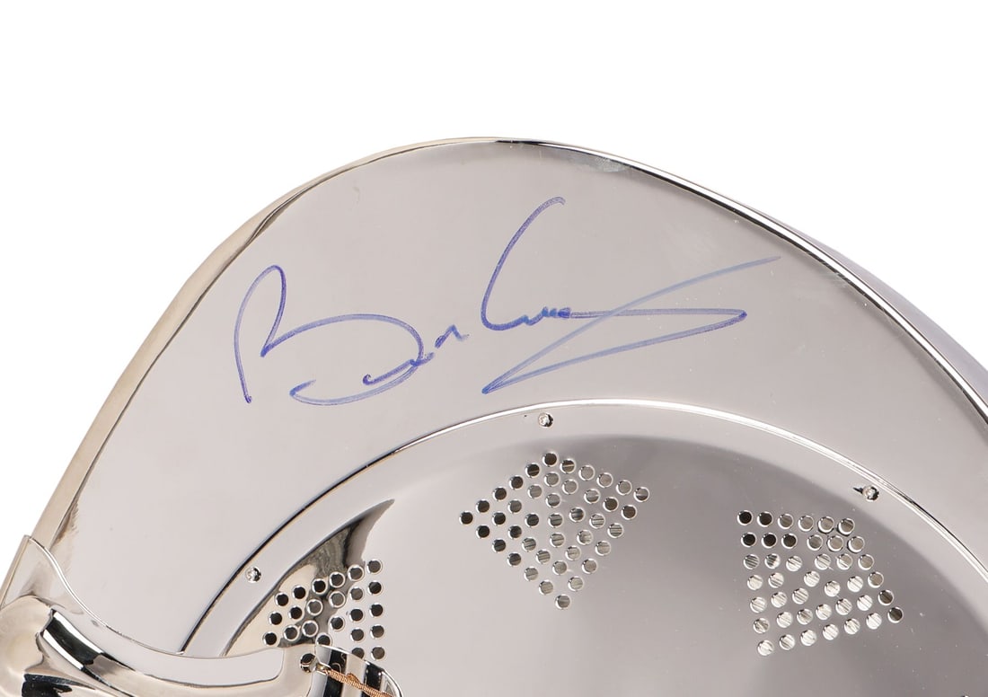 QUEEN - Brian May-Autographed Steel Body Acoustic Fender Guitar: QUEEN - Brian May-Autographed Steel Body Acoustic Fender Guitar All hammer price proceeds from this item are being donated to Strawberry Field, and the guitar is being sold with no reserve. A steel bo