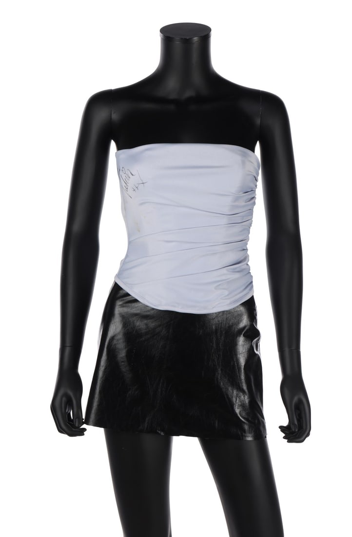 SPICE GIRLS - Victoria Beckham-Autographed Owned Corset and Skirt: SPICE GIRLS - Victoria Beckham-Autographed Owned Corset and Skirt A corset and skirt autographed by Victoria Beckham, known by her stage name Posh Spice. Beckham originally donated these garments, alo