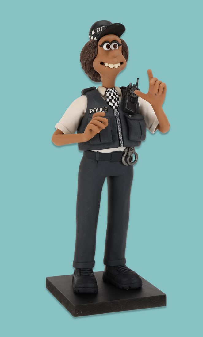 WALLACE & GROMIT: VENGEANCE MOST FOWL (2024) - PC Mukherjee Stop-Motion Puppet: WALLACE & GROMIT: VENGEANCE MOST FOWL (2024) - PC Mukherjee Stop-Motion Puppet "Sorry, Chief! I'm using me gut. Calling all units. Head to the border. Suspect is NOT Wallace, but a small nun in charge