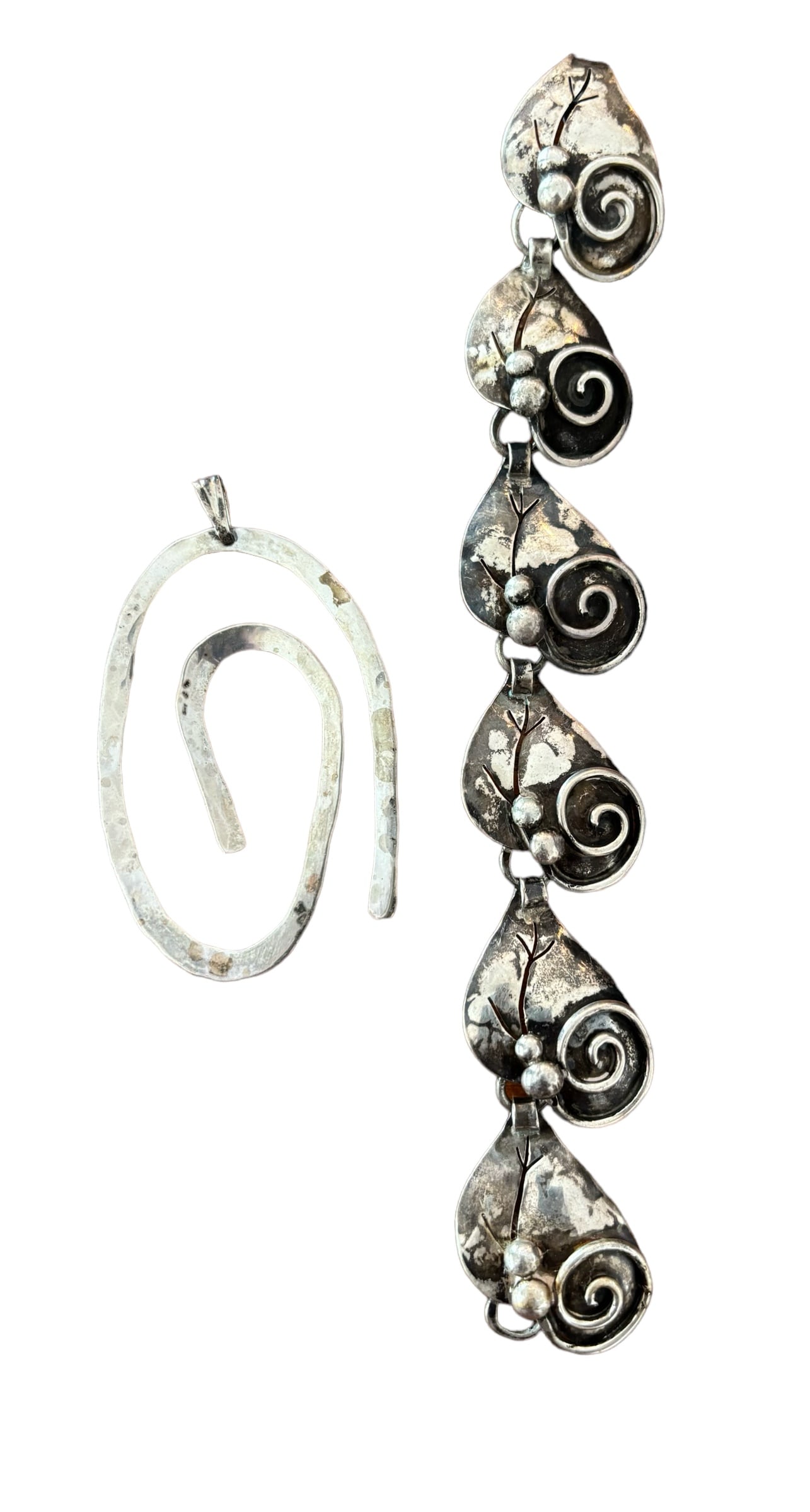 Sterling Silver Accessories: Including; modern design Sterling Silver pendant 3" long, and S.S. bracelet with leaf design hook and eye closure 7.5" long. ! Please see terms and conditions for 3rd party shipping/mover information,