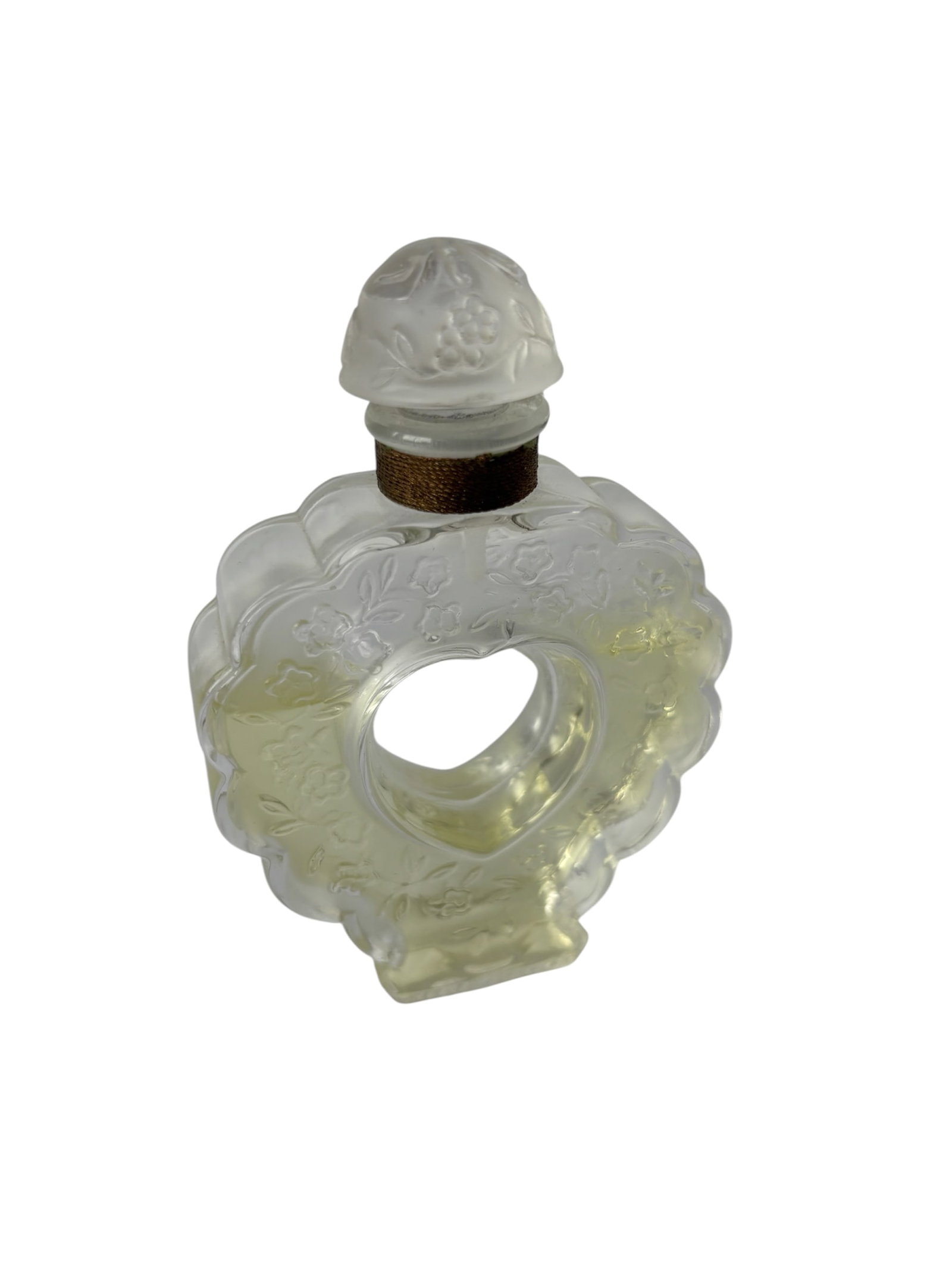 Lalique Nina Ricci "Coeur-Joie" Perfume Bottle: Featuring open heart shaped center made for Nina Ricci c 1950, designed in 1942 by Mark Lalique, Mould formed glass with stopper, floral motif details , acid etched for relief. Original gold thread de