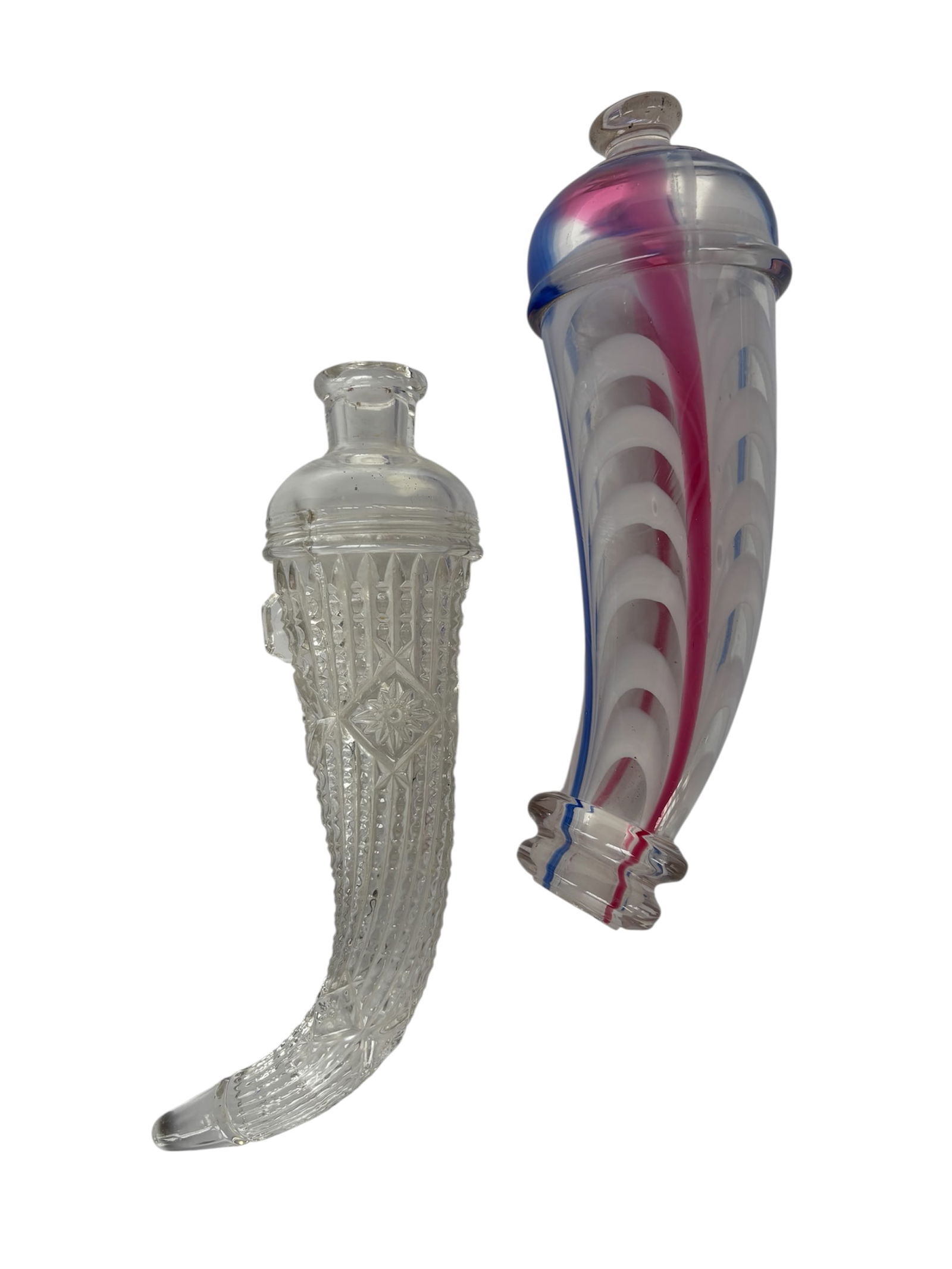 English Blown Glass Powder Horn Flasks: English 19th century free blown glass model of a powder horn flaskIncluding whimsical vibrant pink, blue and white swirl hand-blown powder horn flask and faceted clear glass powder horn flask.