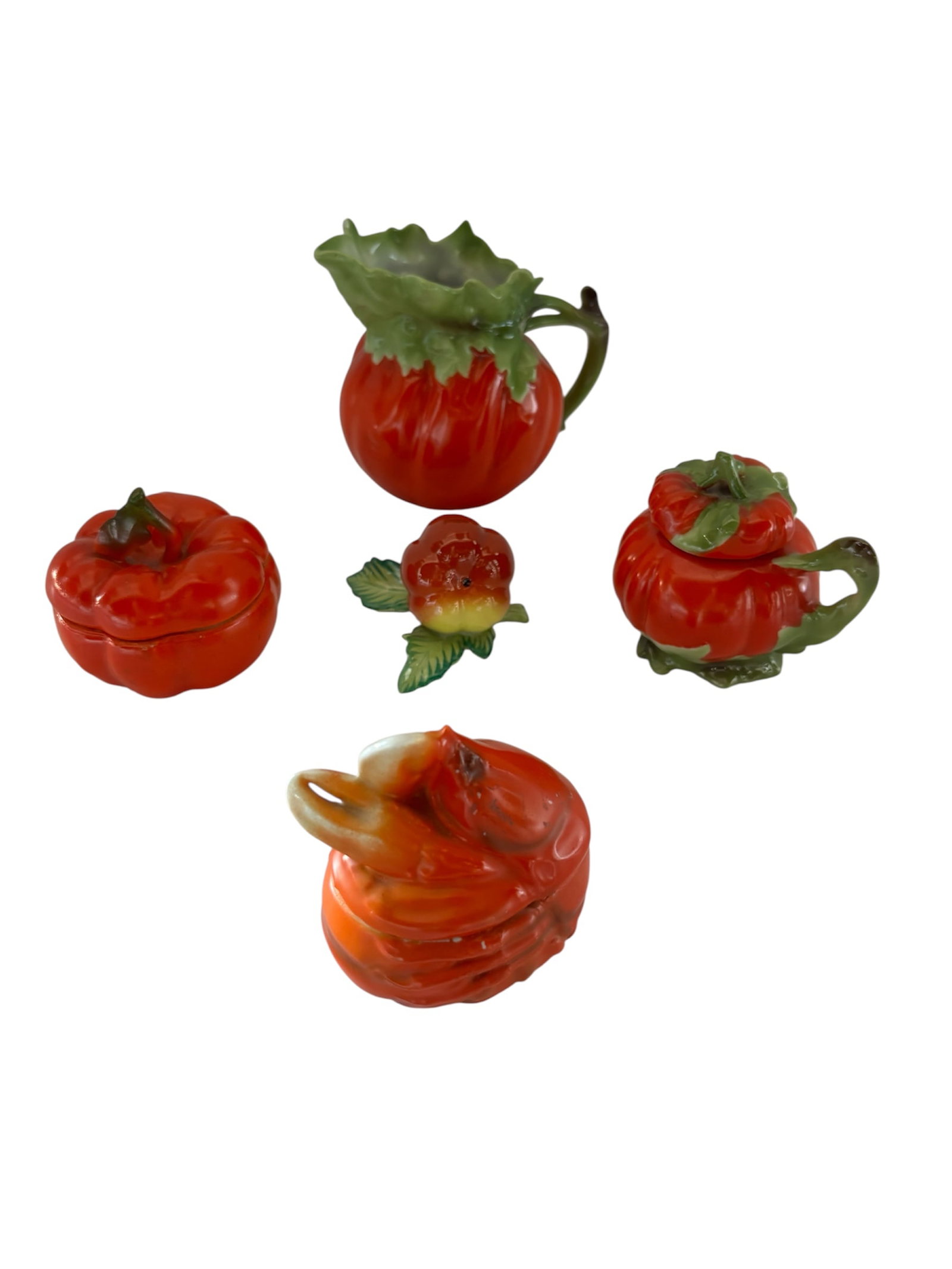 Collection of Royal Bayreuth Porcelain "Tomato Ware": Early 20th Century, each piece designed to resemble a ripe red tomato complete with green leaf details, also included by Royal Bayreuth a "lobster" lidded pot. Lot includes sugar bowl with lid, Herend
