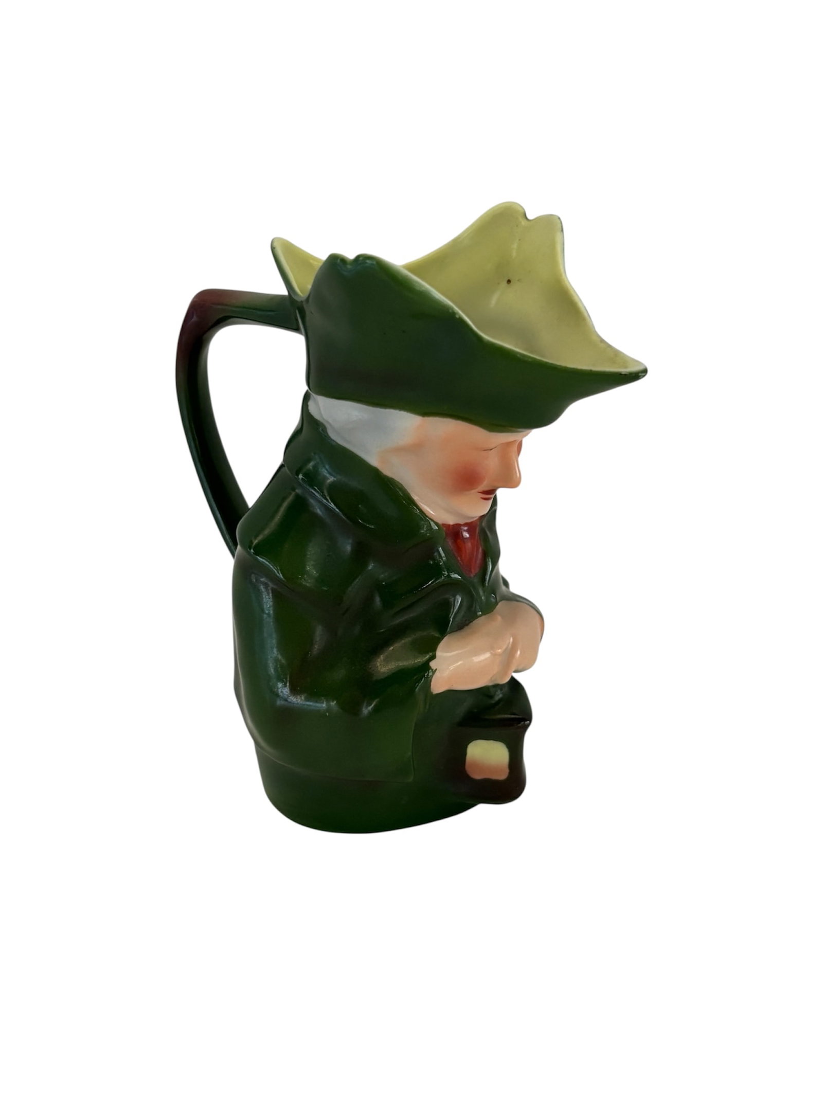 Antique Royal Bayreuth Lamplighter Creamer: Royal Bayreuth antique lamplighter creamer or pitcher, a collectible piece of Bavarian porcelain. Germany. Early 20th Century. Figural design depicting a lamplighter with glossy green finish.