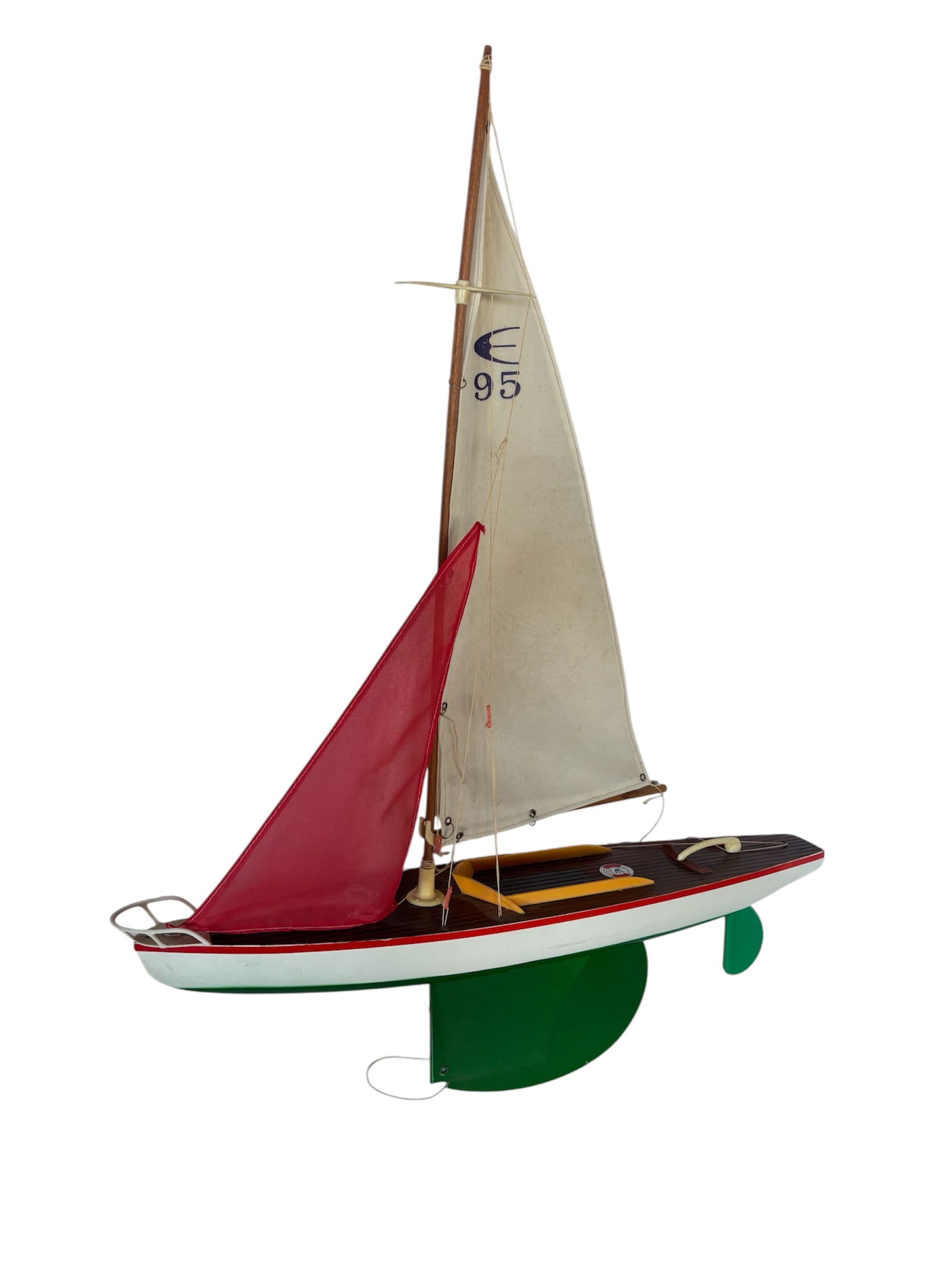 Vintage Giner-Yacht Balandro "Navegable Pond Yacht": Ginger-Yacht, made in Spain 1960-70s "guaranteed to sail" featuring adjustable keel & rudder and Spanish flag detail. Deck details including life savers. Featuring Bermuda rig, red jib and vibrant gre