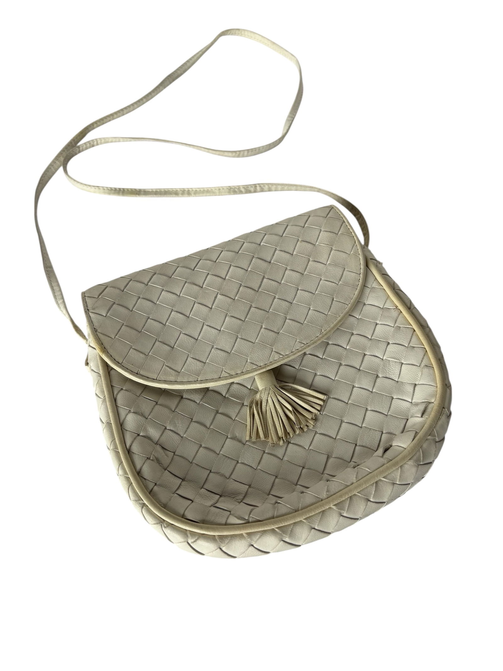 Vintage Bottega Veneta Intrecciato Tassel Crossbody Bag: Featuring white leather intrecciato weave, Napa leather with flap closure and tassel accent. comes with storage bag. Circa 1960. Purchased directly from Bottega in New York and London. Not officially
