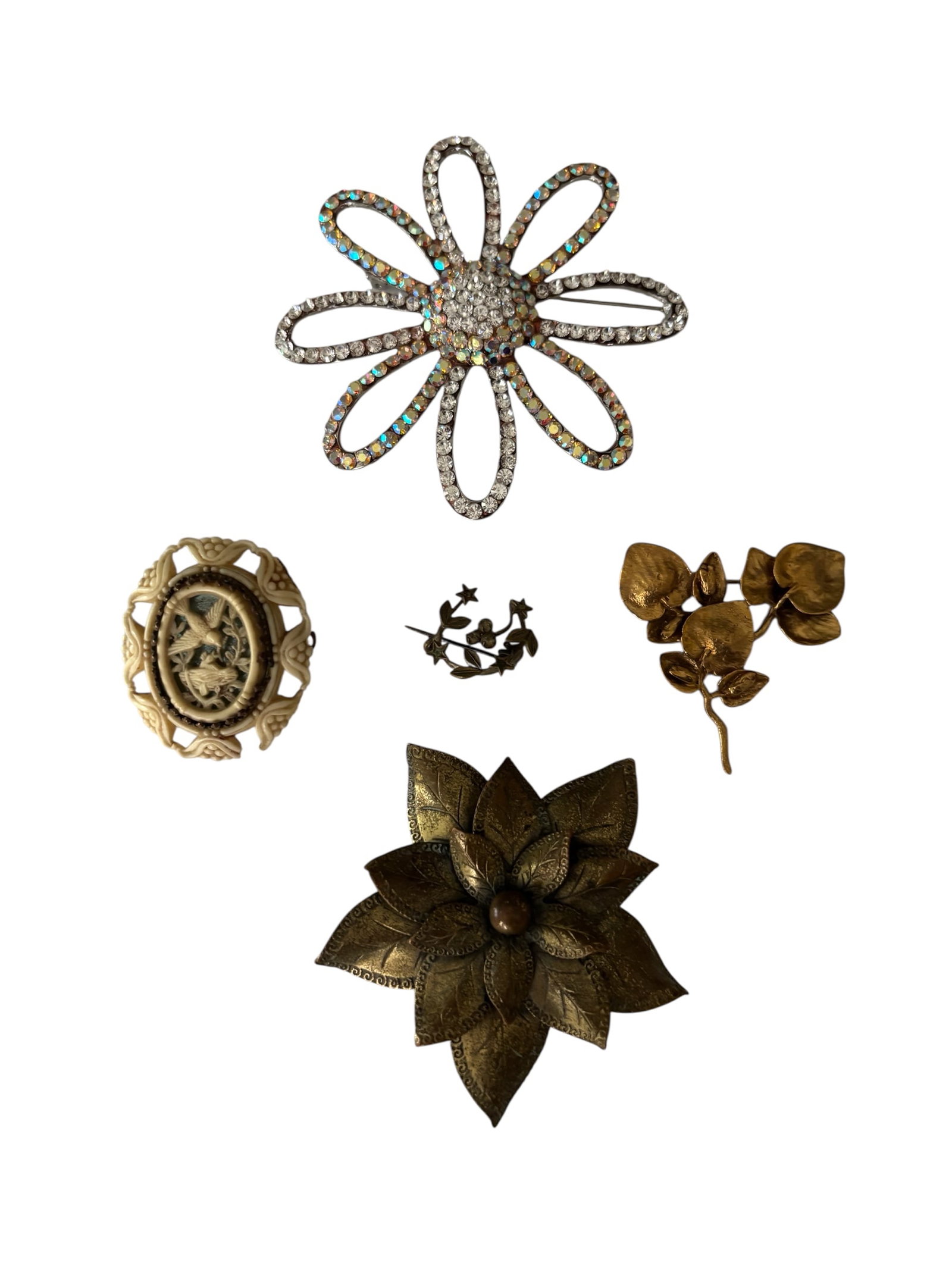 Antique & Vintage Botanical Brooches: Featuring eucalyptus gold-plate brooch from Museum Co. Leaf Jewelry, celluloid early 1920s French art deco brooch, intricate carving with central motif depicting birds, vintage large rhinestone floral