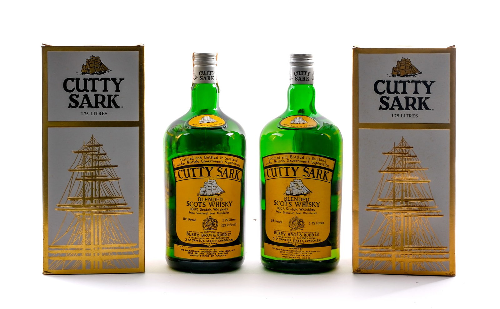 Cutty Sark Scotch Whisky Magnums: Description 86 Proof. Original cardboard boxes in fair condition with some deterioration and general staining throughout. Mold present on packaging and glass decanters. Foils intact. Stamp seal missin