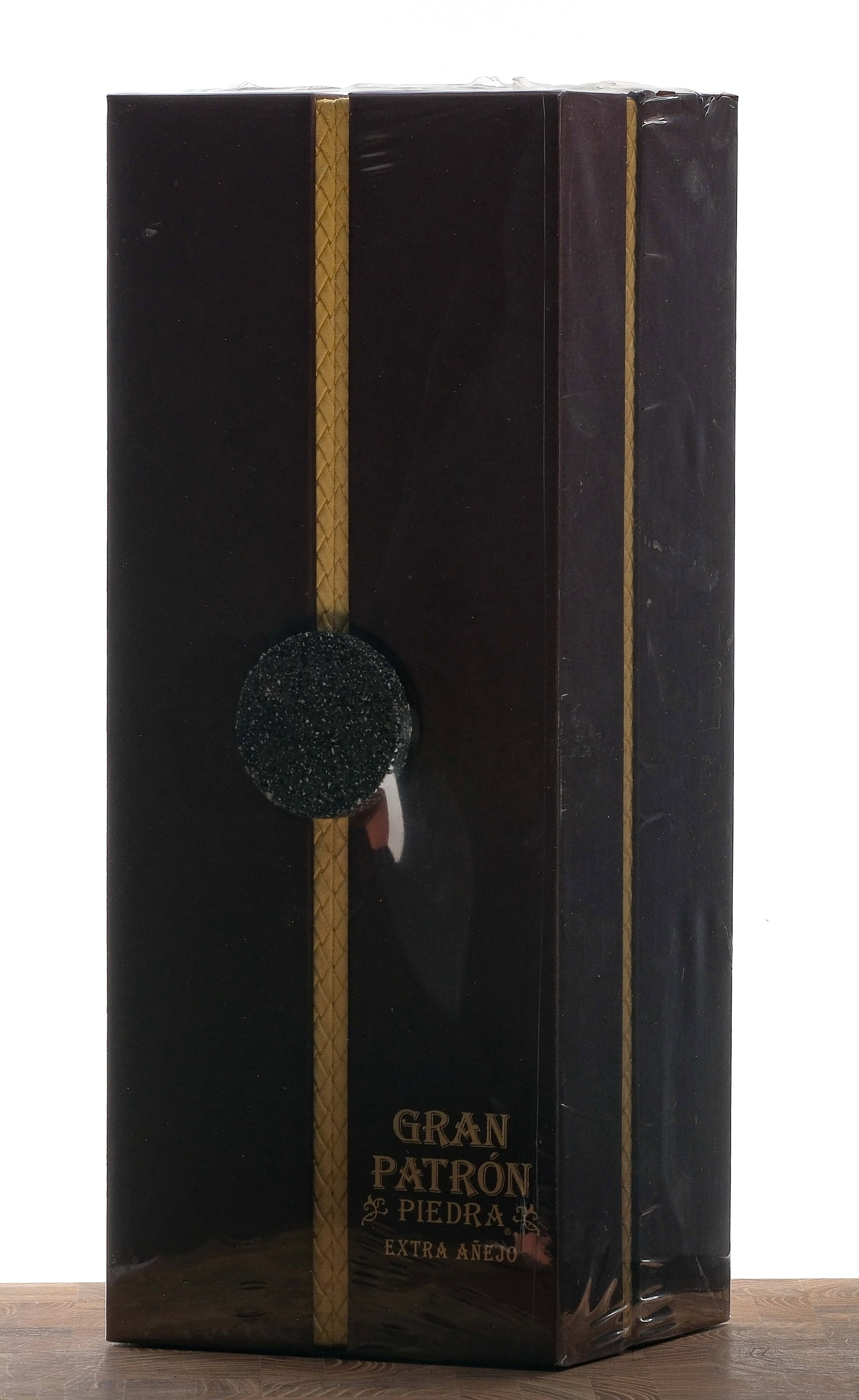 Gran Patron Piedra Extra Anejo Tequila: 40% ALC/VOL (80 Proof). Cardboard box still in shrink-wrap. 750ml. The Patron Spirits Company.