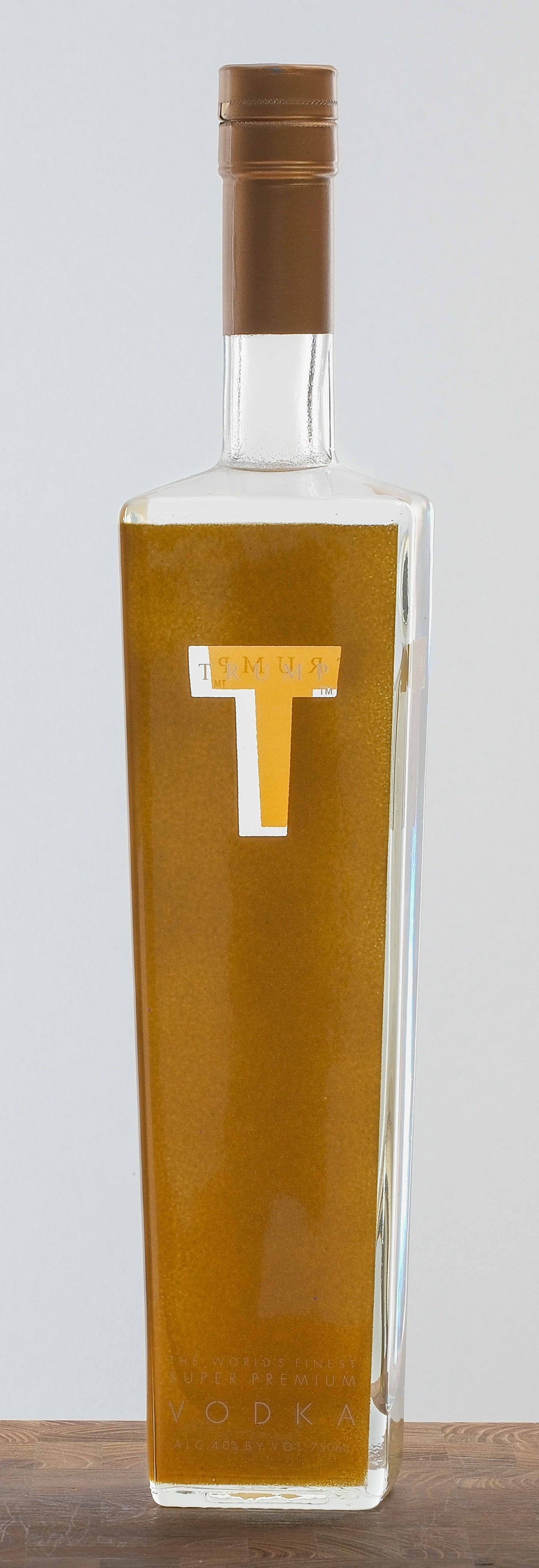 Trump "The World's Finest Super Premium" Vodka: 40% ALC/VOL. Foil excellent as is gold leaf label (with logo designed by Milton Glaser (of "I <3 NY" fame). 750ml. A.H. Wanders B.V. Mid to late 2000's/early 2010's..
