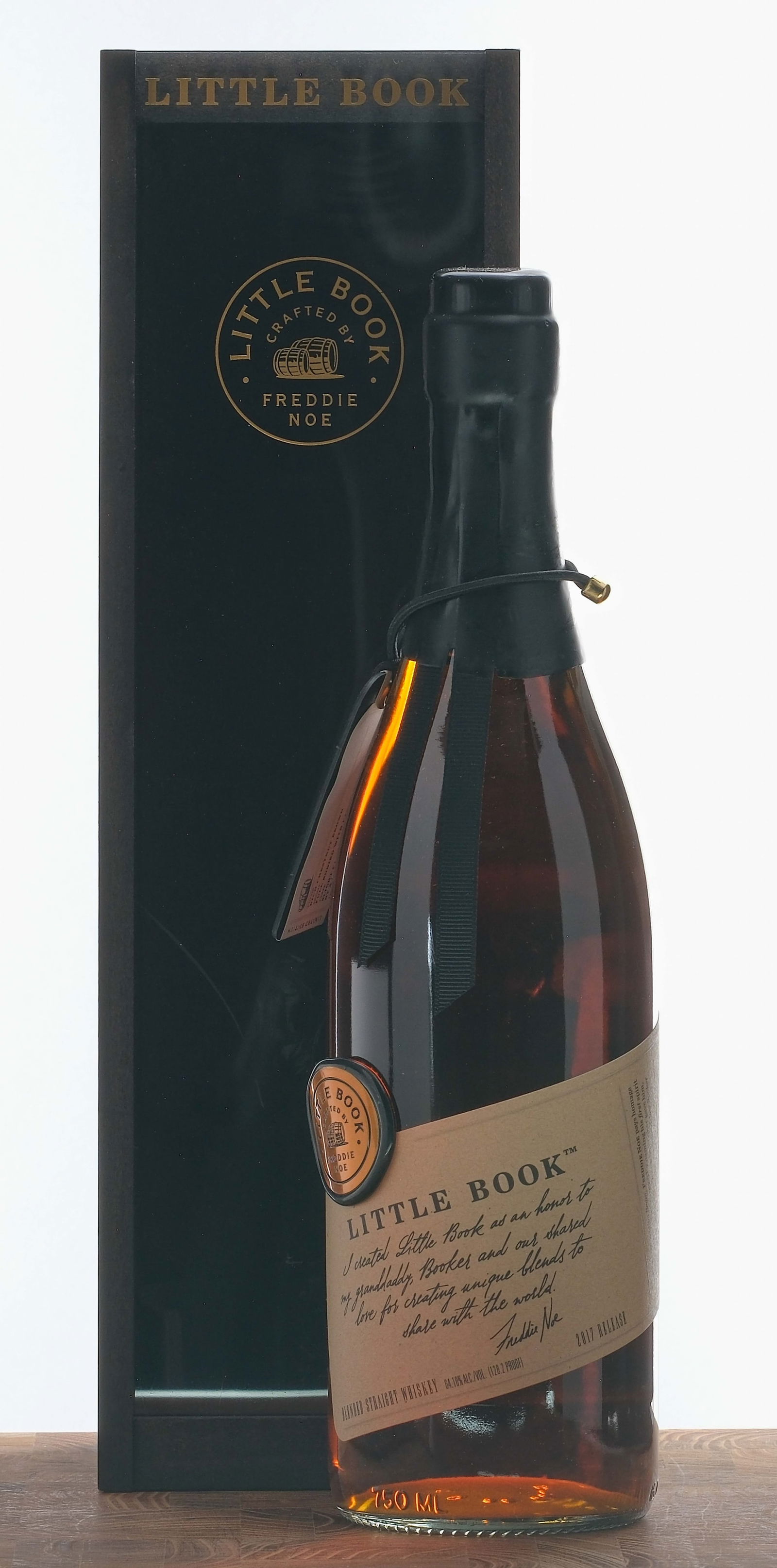 Little Book Batch #1: "The Easy" Blended Straight Whiskey 2017: Limited Edition. Recipe 002. 64.10% ALC/VOL (128.2 Proof). Wooden box excellent. Acrylic window exhibits some scratches and scuffs. Wax seal intact. Wax stamp lifting slightly. Hang tag intact. Labels