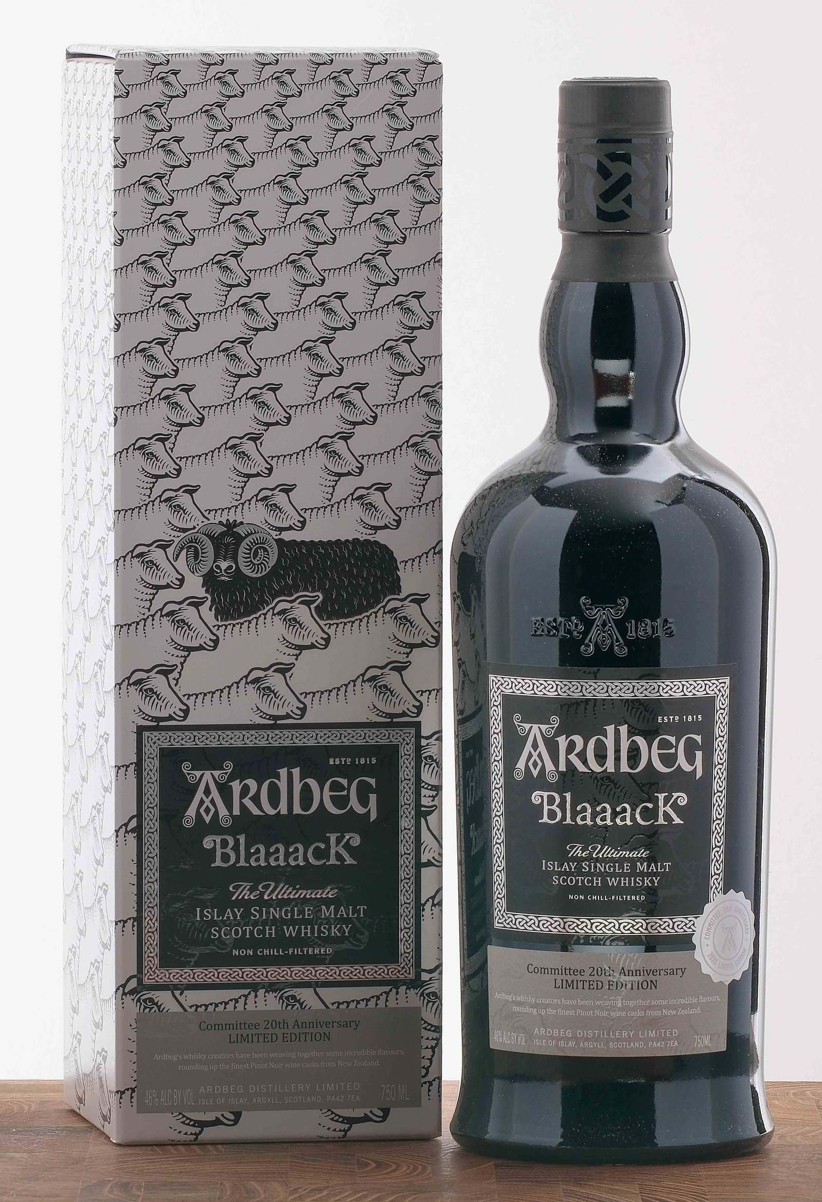 Ardbeg "Blaaack" Islay Single Malt Scotch: Committee 20th Anniversary 2020 Limited Edition. Matured in New Zealand Pinot Noir casks. 46% ALC/VOL. Original cardboard box largely excellent (there is a noticeable crease near the top fold and on t