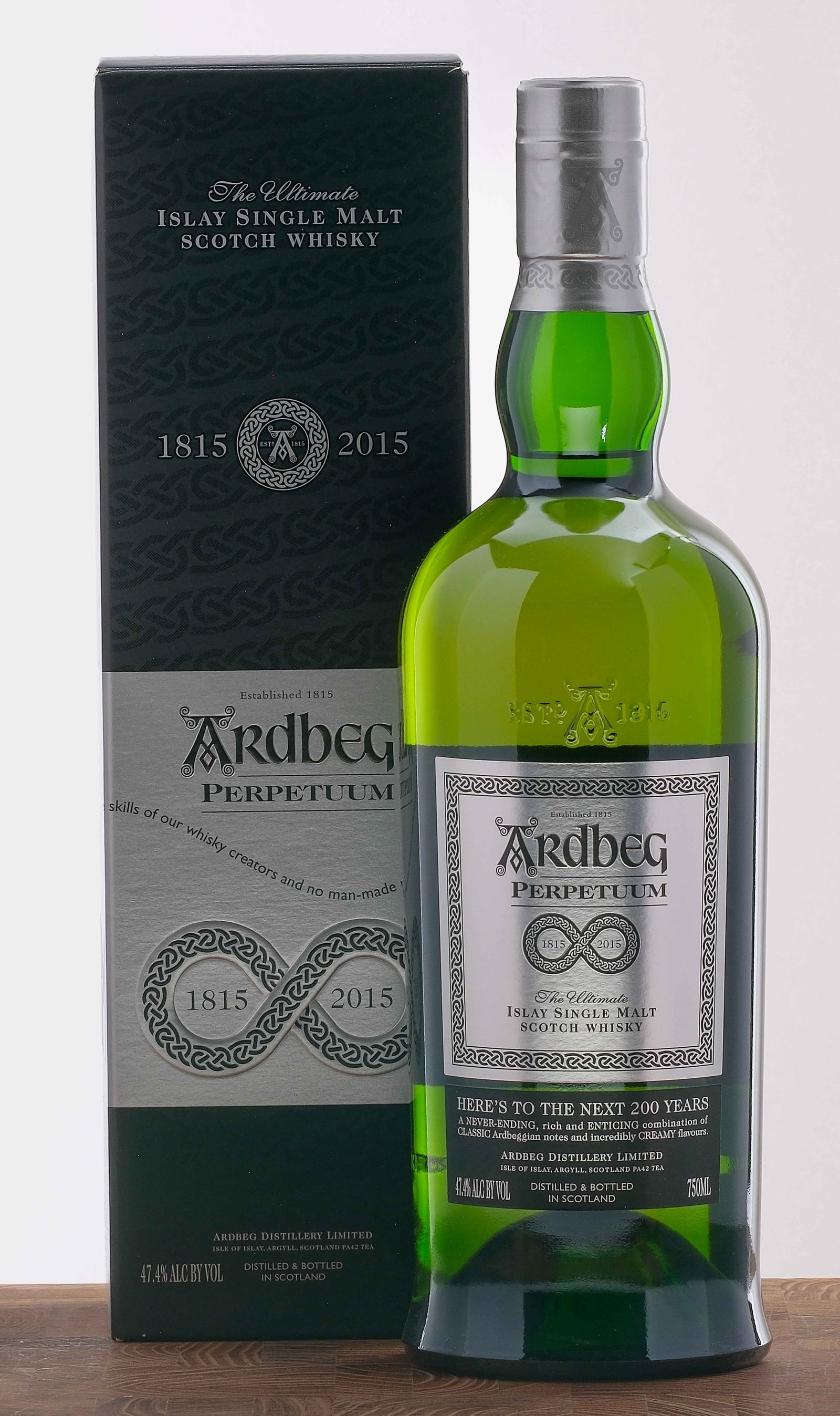 Ardbeg "Perpetuum" Islay Single Malt Scotch 2015: Celebrating 200 years of Ardbeg. 47.4% ALC/VOL. Original cardboard box in excellent condition. Foils and labels excellent. 750ml. Ardbeg Distillery Limited.