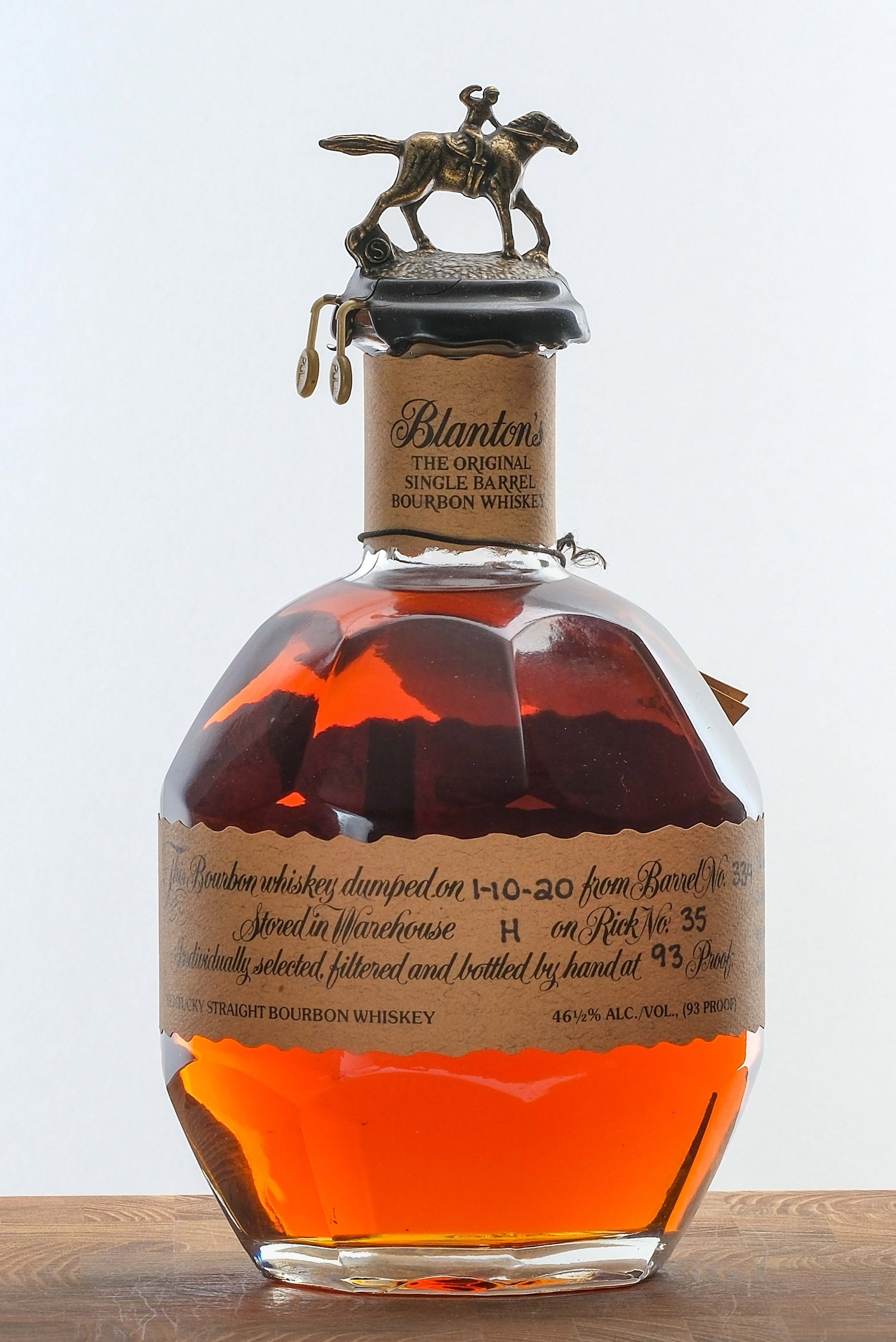 Blanton's Single Barrel Bourbon 2020: Dumped on 1-10-20 from Barrel No. 334. Stored in Warehouse H on Rick No. 35. Registered Bottle No. 49. 46.5% ALC/VOL (93 Proof). Wax seal intact. Hang tag intact. Labels largely excellent (instance of