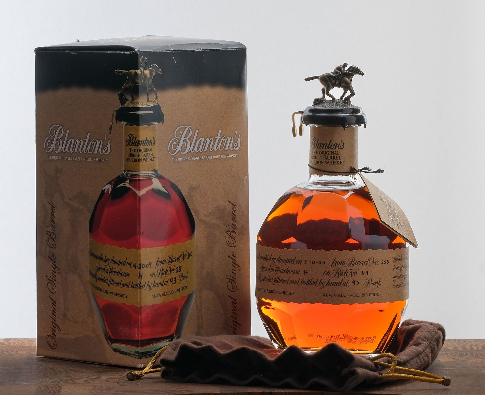 Blanton's Single Barrel Bourbon 2023: Dumped on 3-10-23 from Barrel No. 283. Stored in Warehouse H on Rick No. 69. Registered Bottle No. 50. 46 1/2% ALC/VOL (93 Proof). Original cardboard box is fair, exhibiting some folding and creasing